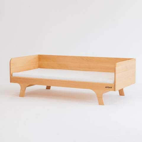 A beige Hug Hug Bed 90x200 cm