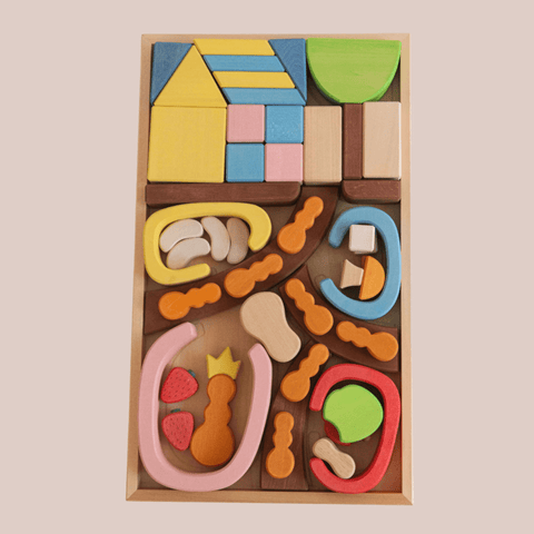A wooden ant block set designed to represent an ant house, with various shaped pieces displayed in a wooden box
