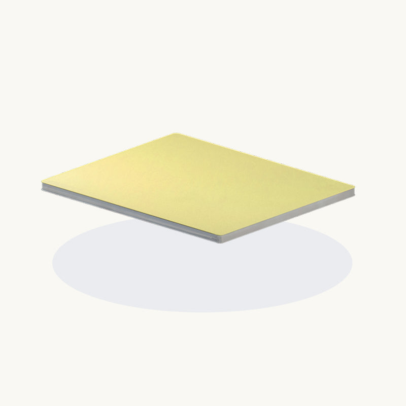 Rectangular yellow gym mat with a gray edge on a white background