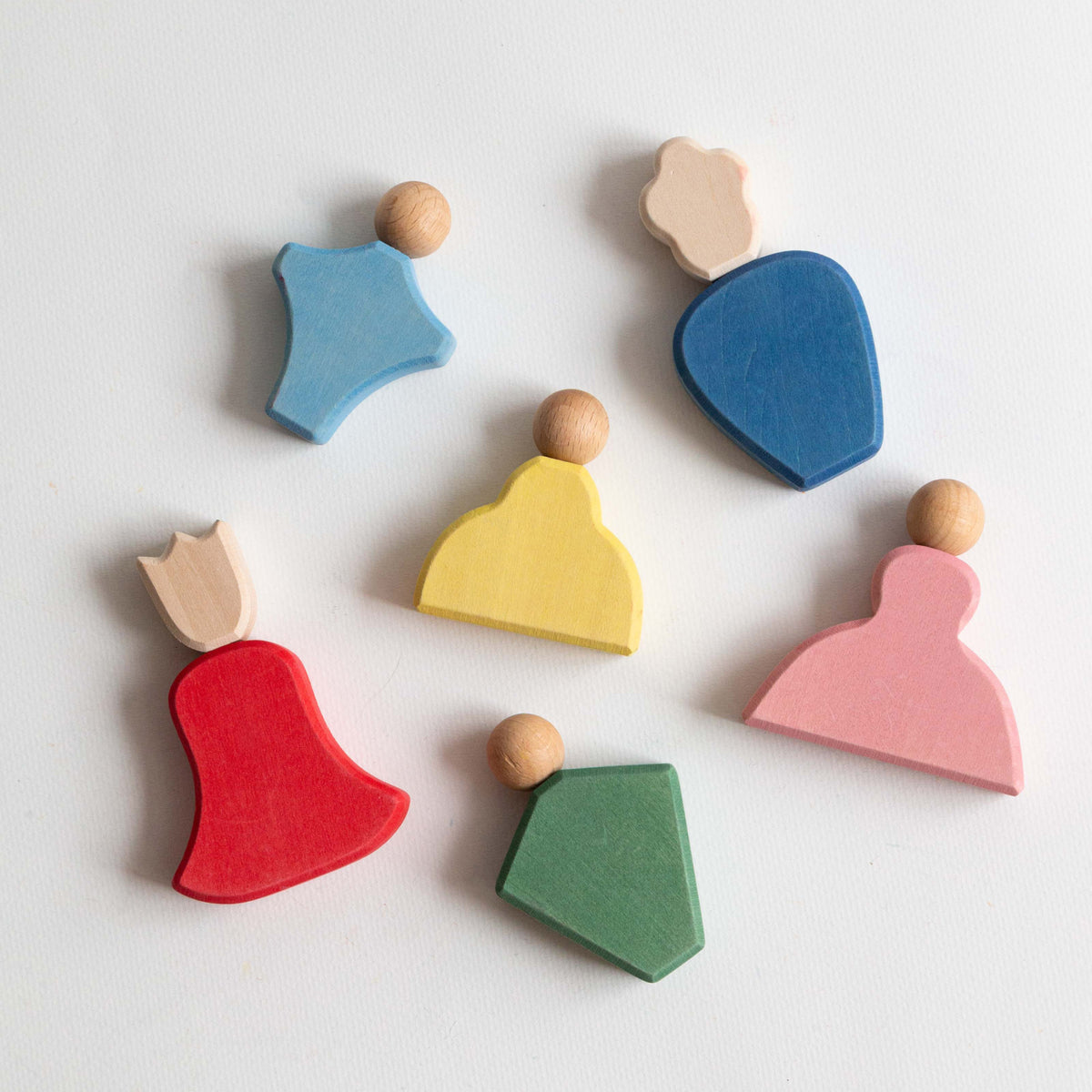 Fairytale Family set with five wooden figures in red, blue, yellow, green and pink