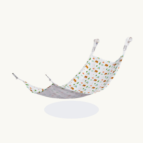 White fabric hammock for the AVDAR gym with colorful animal and tree print