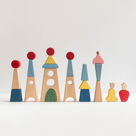 Set of colorful toy castles on a white background