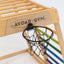 Wooden climbing frame with a basketball hoop labeled 'AVDAR GYM' on a white background