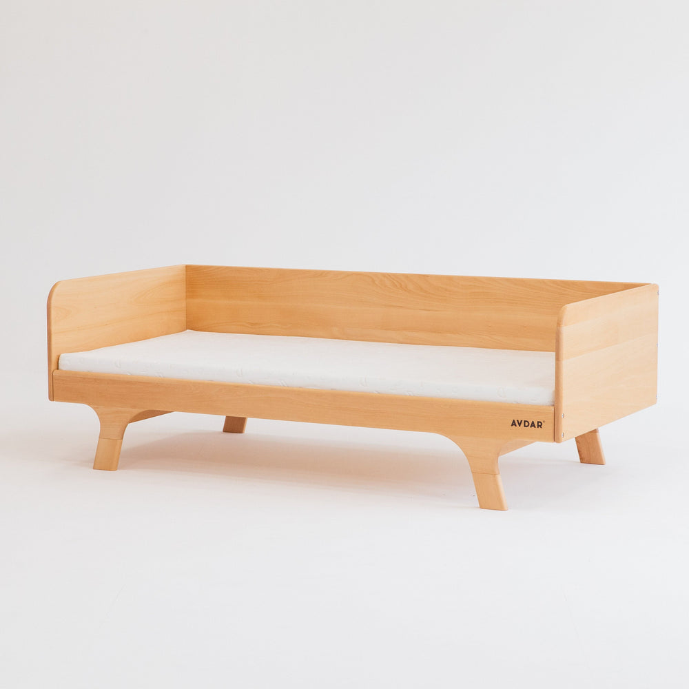 A beige Hug Hug Bed 90x200 cm