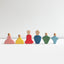 Set of colorful wooden peg dolls on a white background