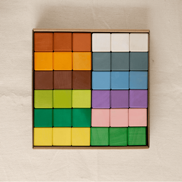 Four Seasons Cube Blocks in rows of colorful wooden cubes inside a square storage tray