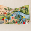 Kingdom Valley play cloth arranged as a backdrop and floor mat with wooden castle blocks