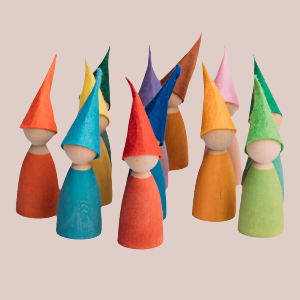 A set of colorful wooden peg dolls with different colored hats, standing upright.